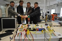 Albert Tovar, especialista en seguretat d’Omron; Xavier Roca, director de l’ESEIAAT; Lluis Puit, director industrial de Teknics, i Josep Robles, cap de projecte de Teknics.